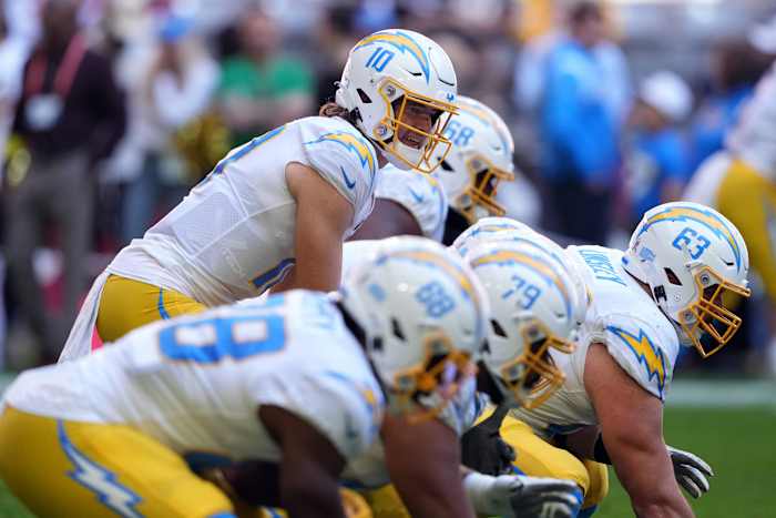 Nov 27, 2022; Glendale, Arizona, USA; Los Angeles Chargers quarterback Justin Herbert (10) warms up prior to facing the Arizona Cardinals at State Farm Stadium. Mandatory Credit: Joe Camporeale-USA TODAY Sports